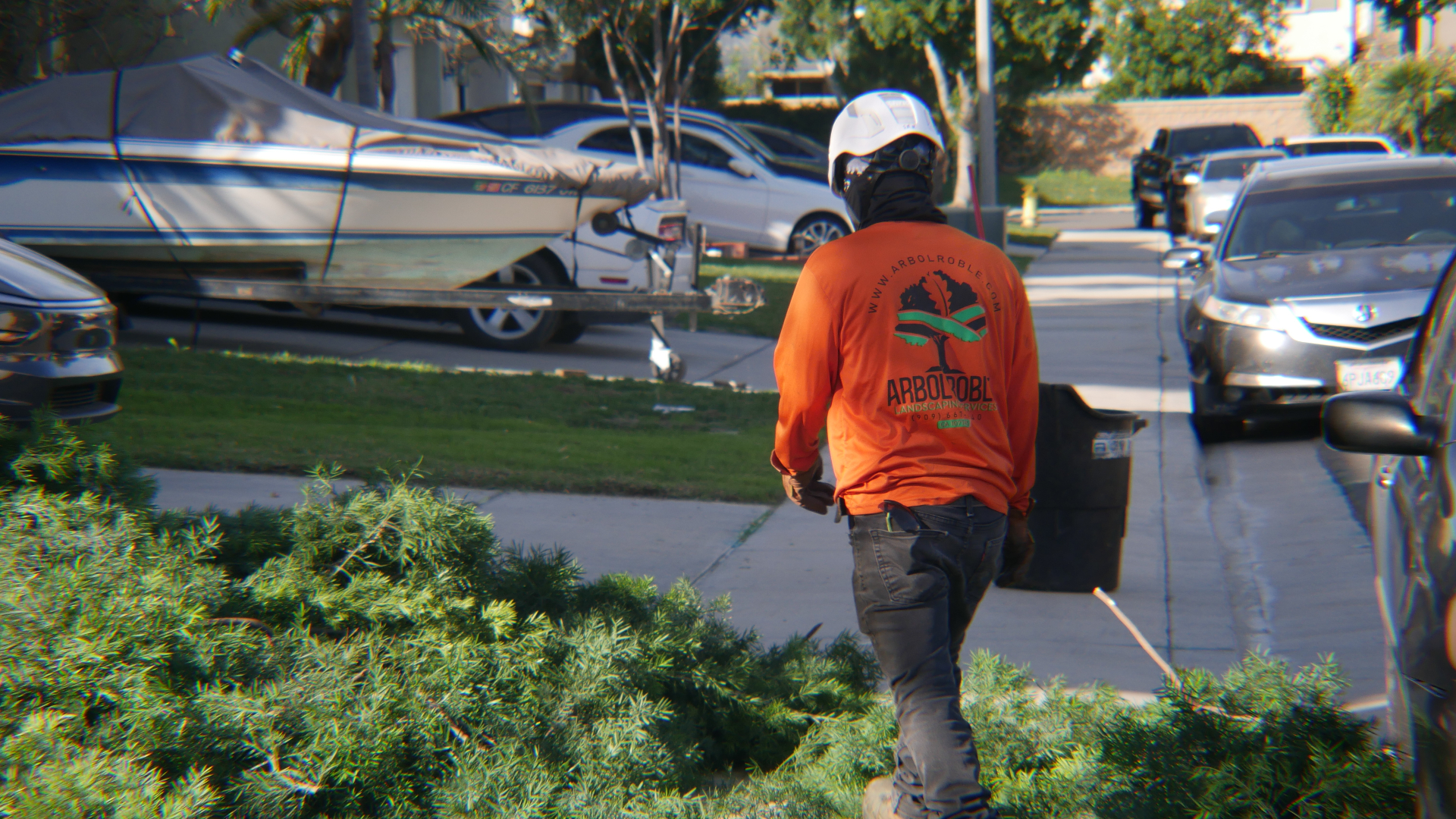 Arbol Roble team member walking on property